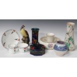 A collection of Art Deco and later decorative ceramics, including a Poole pottery vase, decorated