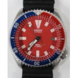A Seiko Automatic Diver's wristwatch, the signed red dial with date-of-the-month aperture, white