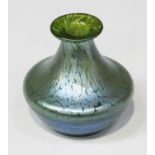 An Art Nouveau Loetz iridescent green glass Papillon pattern vase, circa 1900, of wasted squat form,