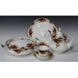 A Royal Albert 'Old Country Roses' pattern part service, including two tureens and covers, a large