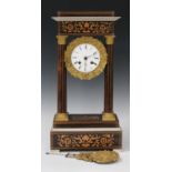 A 19th century and later French rosewood portico mantel clock with eight day movement striking on