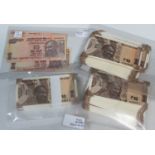 A large collection of India ten rupee banknotes, mostly uncirculated.Buyer’s Premium 29.4% (