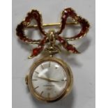 A Movado 18ct gold and red enamelled pendant watch with a signed jewelled movement, the signed