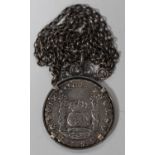 A pillar dollar 1742 Mexico City Mint, mounted as a pendant, detailed to the rim 'Treasure from "