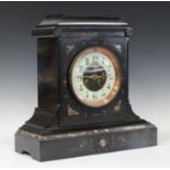 A late 19th century slate and marble inlaid mantel clock with eight day movement striking on a gong,