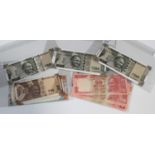 A collection of Indian banknotes, including a five hundred rupees, dated 2017 error, and a