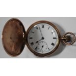 A 9ct gold keyless wind hunting cased quarter repeating gentleman's pocket watch, the gilt