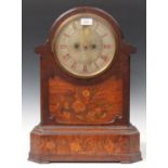 A Victorian walnut and marquetry inlaid mantel clock with eight day twin fusee movement striking