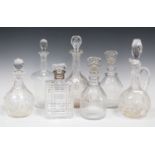 A group of glass decanters and stoppers, 19th century and later, including a pair of triple ring