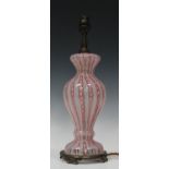 A Venetian glass lampbase, late 19th/early 20th century, the clear baluster body decorated with