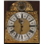 An Edwardian inlaid mahogany longcase clock with eight day movement chiming on eight bells and