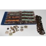 A collection of 19th and 20th century world coins, including a restruck Maria Theresa thaler, four
