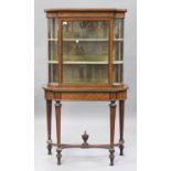 An Edwardian Neoclassical Revival satinwood break-bowfront display cabinet-on-stand with inlaid