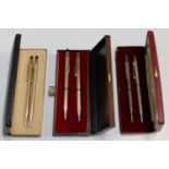 A Cross silver cased 'Queen's Silver Jubilee' edition propelling pencil and ballpoint pen set,