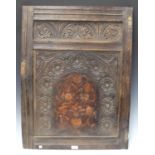 A late 17th/early 18th century fielded oak panel, marquetry inlaid with a flower-filled urn within
