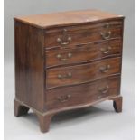 A George III mahogany serpentine fronted bachelor's chest of four graduated long drawers, fitted