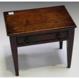 A 19th century mahogany diminutive model of a side table, fitted with a single drawer, on tapering