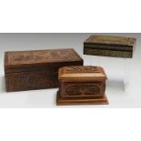 A late 19th/early 20th century Continental carved satin walnut jewellery casket, width 13.5cm,