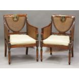 A pair of Edwardian Neoclassical Revival satin birch bergère armchairs with painted decoration,