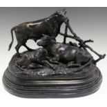 After Jules Moigniez - a modern cast bronze model group of three cows, the base bearing facsimile