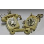 Two mid-20th century 700 series ivory plastic telephones, both marked '706L HAS 66/1' to