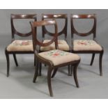 A set of four early 19th century mahogany bar back dining chairs, in the manner of Gillows, the