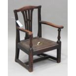 A George III mahogany splat back child's armchair, height 55cm, width 42cm (cut down high chair).