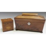 A small George III mahogany and crossbanded tea caddy, the front inlaid with a flowerhead patera,