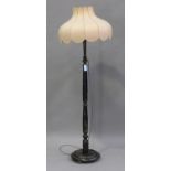 A George V black chinoiserie lamp standard with circular base, height 170cm.Buyer’s Premium 29.4% (