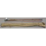 A group of four fishing rods, including a Redpath & Co split cane three-piece rod.Buyer’s Premium