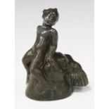 Just Anderson - an early 20th century Danish green patinated cast metal figure of an infant merman