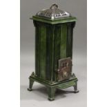 A Belgian Art Deco green enamelled stove, marked 'Unic Les Fonderies Bruxelloises', raised on