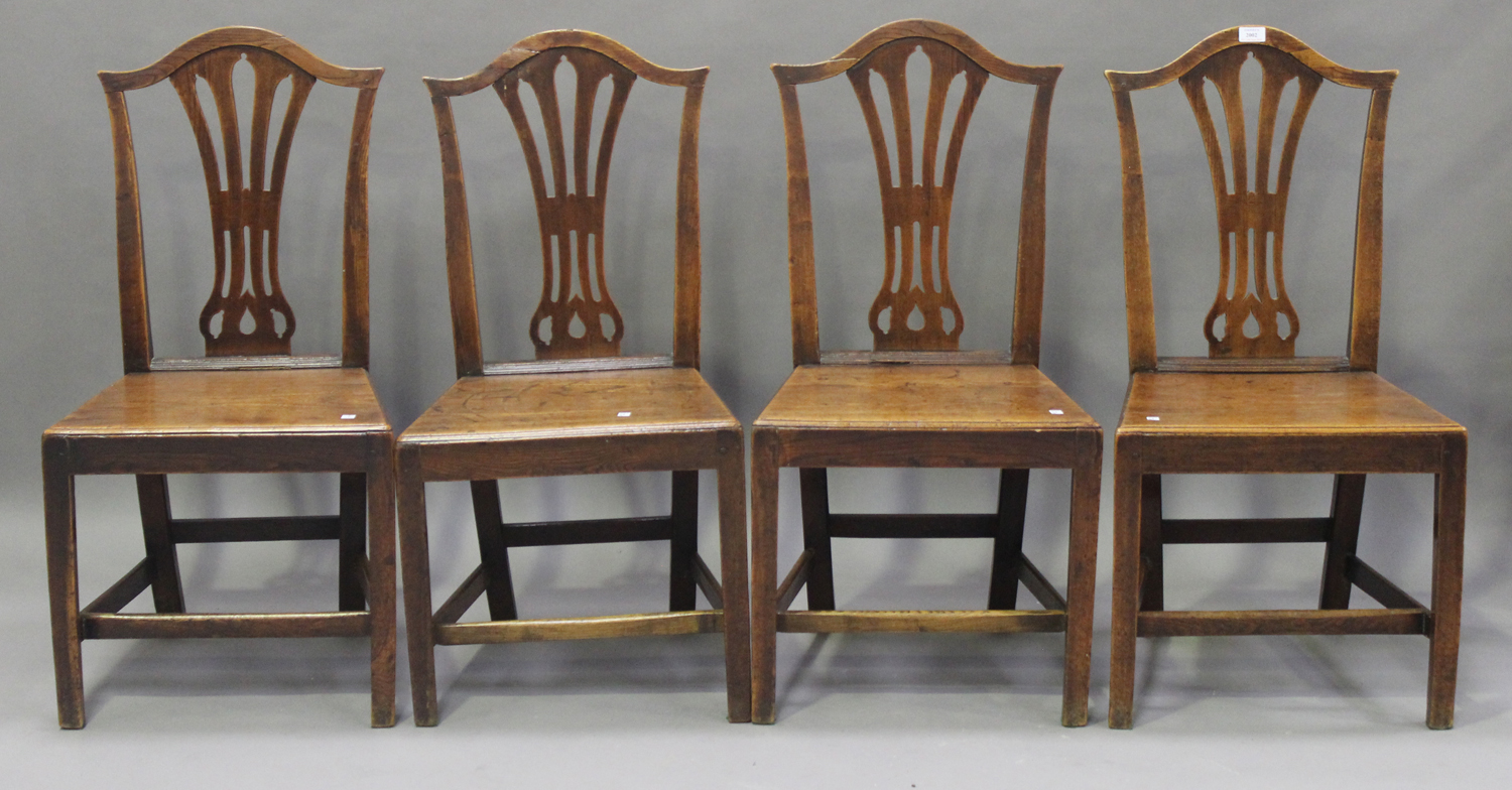 A harlequin set of ten George III provincial elm pierced splat back dining chairs, all with solid - Image 2 of 2