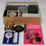 A collection of approximately seventy-one mainly mid/late 20th century powder compacts by various