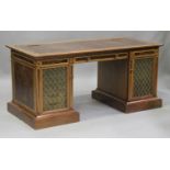 A late 20th century David Linley burr walnut and ash twin pedestal desk with line inlaid decoration,