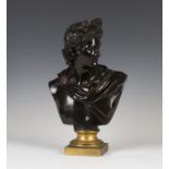 After the antique - a late 19th/early 20th century brown and gilt patinated cast bronze head and