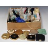A collection of approximately eighty-nine mainly mid/late 20th century powder compacts by various
