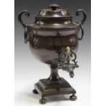 An early 19th century patinated bronzed copper samovar of classical urn form, fitted with ring