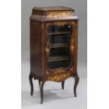 A late Victorian rosewood and marquetry inlaid music cabinet with gilt metal mounts, fitted with a