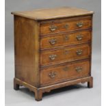 A late 20th century George I style walnut bachelor's chest by Titchmarsh & Goodwin, the feather