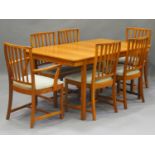 A mid-20th century McIntosh & Co teak extending dining table, height 75cm, length 160cm, depth 92cm,