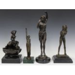 A modern brown patinated cast bronze model of a nude maiden seated beside a shell, on a black