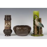 Three pieces of Bretby pottery, late 19th century, comprising an Aesthetic spill vase, modelled as a