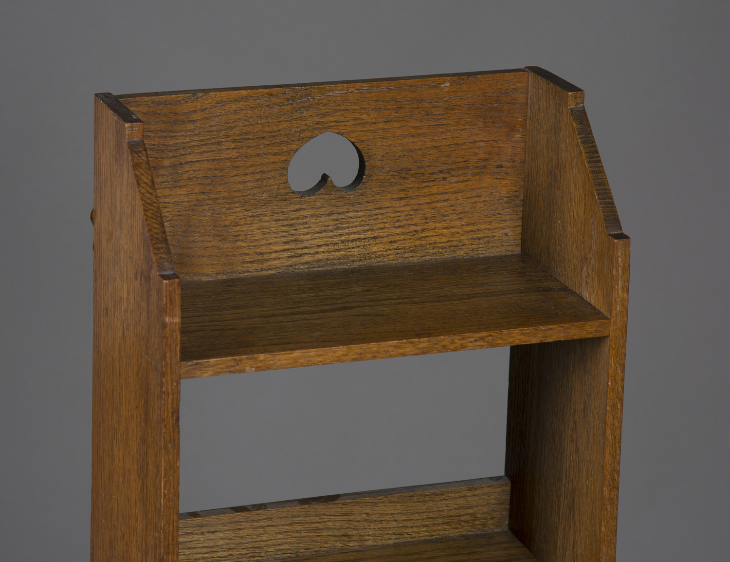 An early 20th century Arts and Crafts oak open bookcase, the gallery back with a pierced inverted - Image 2 of 2