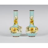 A pair of Doulton Lambeth Faience bottle vases, circa 1873-91, decorated by Elizabeth Shelley,