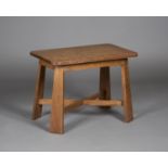 An Edwardian Arts and Crafts oak occasional table, probably Glasgow School, the rectangular top