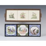 A set of three H. & G. Thynne tiles, circa 1900, each with floral decoration, mounted as a tray with