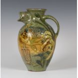 A C.H. Brannam Barum pottery ewer, dated 1896, decorated by James Dewdney, monogrammed, with a large