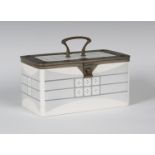 A porcelain lunch or picnic box with WMF silver plated mounts, early 20th century, designed by