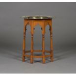 A late 19th/early 20th century Arts and Crafts Moorish style walnut octagonal occasional table,